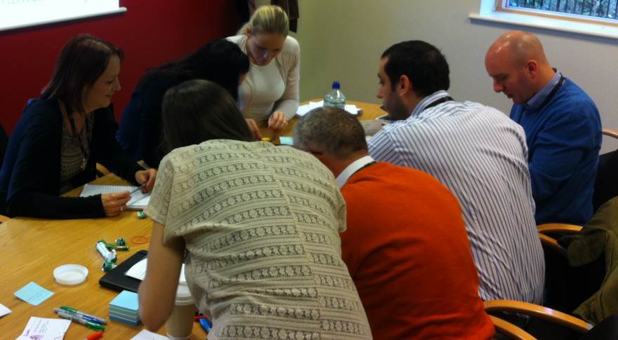 What does scrum mean? Students engage in an exercise during a scrum class to find out
