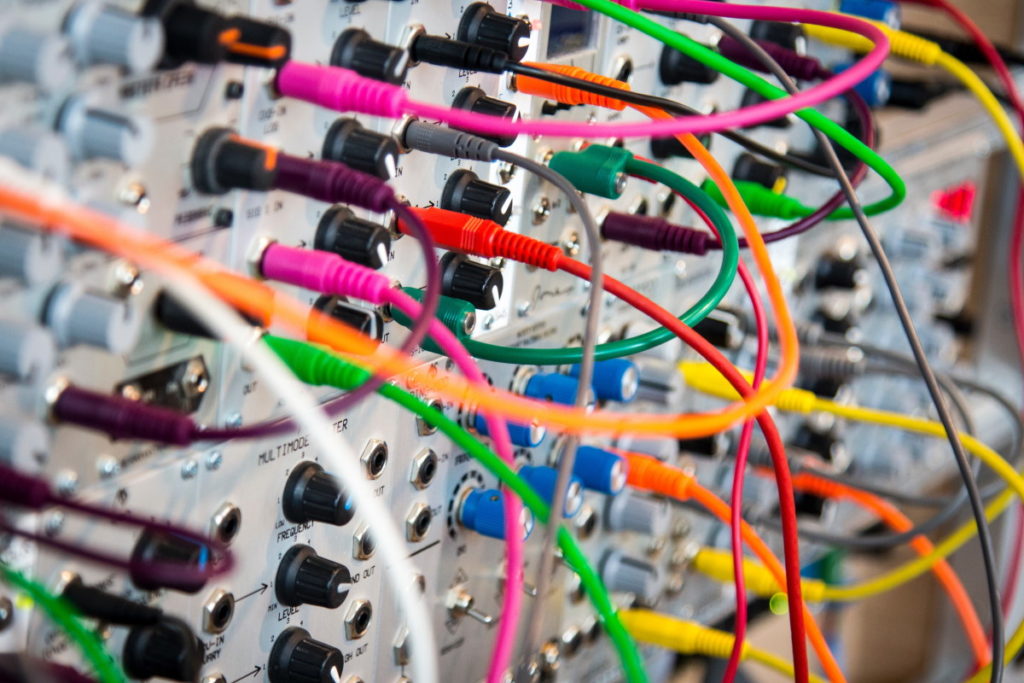 Electrical equipment connected by a myriad of wires. An analogy for the connections between the agile manifesto and Scrum

Photo by John Barkiple on Unsplash